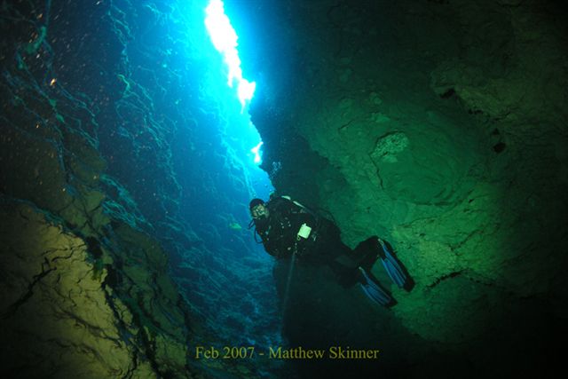 Diver in the Chasm of Pics.